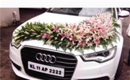 اجاره ماشین عروس آئودی و تزیین با گل